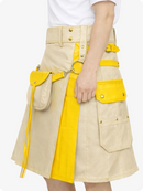 Beige and yellow skirt with a belt and handbag on a white background
