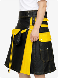 Black and yellow kilt worn by a person on a white background