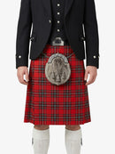 Person wearing a red tartan kilt with a black jacket on a white background