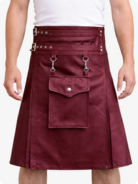 Burgundy kilt with silver hardware worn by a person on a white background