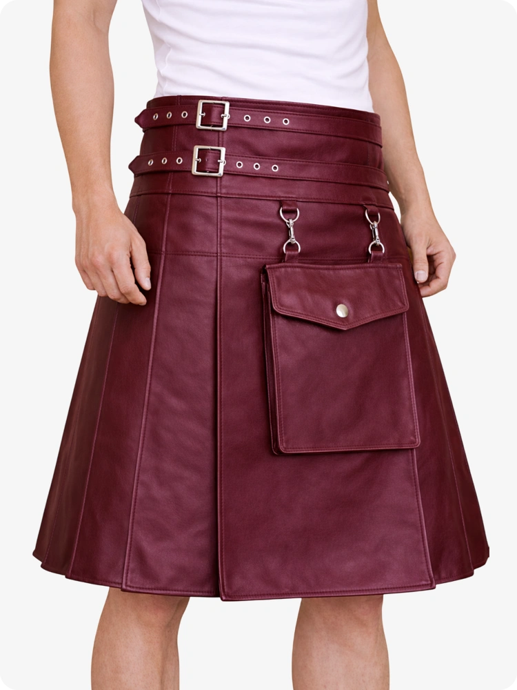 Burgundy leather skirt with silver buckles and hardware on a white background