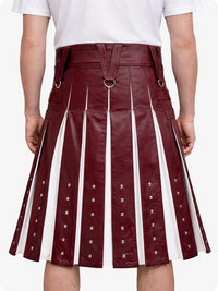 Burgundy leather skirt with white stripes and silver buttons on a white background