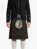 Person wearing a traditional Scottish kilt with a tartan pattern on a white background