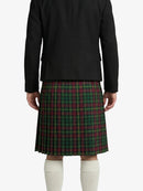 Person wearing a black jacket and green plaid kilt on a white background