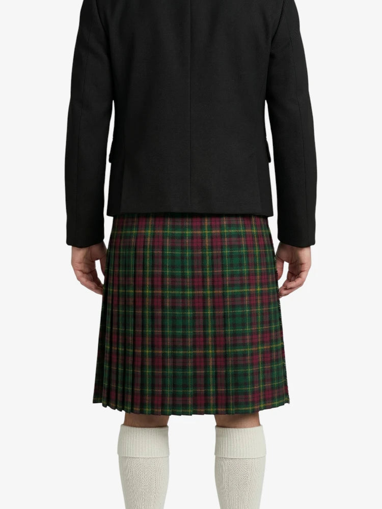 Person wearing a black jacket and green plaid kilt on a white background