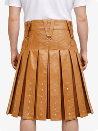Camel pleated leather skirt with silver studs on a white background