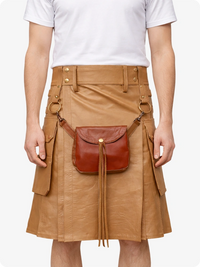 Person wearing a Camel leather Kilt with a brown leather bag on a white background