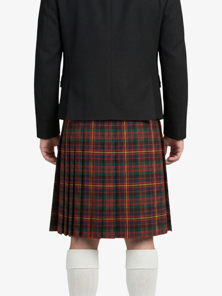 Person wearing a black jacket and red plaid kilt on a white background