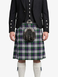 Person wearing a traditional Scottish kilt with a sporran on a white background
