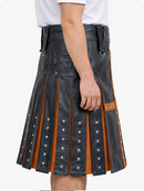 Charcoal leather kilt with orange accents worn by a person on a white background