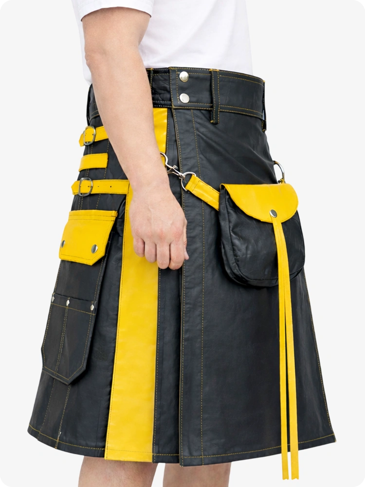 Charcoal and yellow kilt worn by a person on a white background