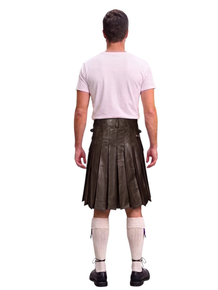 A man shown from the back wearing a dark brown leather kilt, a light pink t-shirt, cream-colored knee-high socks, and black shoes, isolated on a white background.