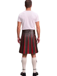 A man shown from the back wearing a dark brown leather kilt with red pleated inserts, a white t-shirt, white knee-high socks, and black shoes, against a plain white background.