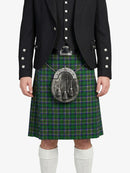 Person wearing a black jacket and green plaid kilt on a white background