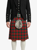 Person wearing a black jacket and red plaid kilt with a silver sporran on a white background