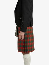 Person wearing a black jacket and red plaid kilt on a white background