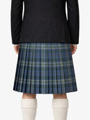 Person wearing a black jacket and blue plaid kilt on a white background