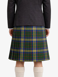Person wearing a dark gray jacket and plaid kilt on a white background