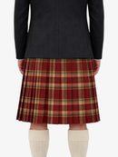 Person wearing a black jacket and red plaid kilt on a white background