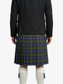 Person wearing a black jacket and plaid kilt on a white background