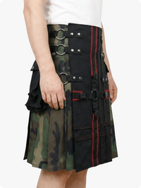 Person wearing a unique kilt design with camouflage and black patterns on a white background