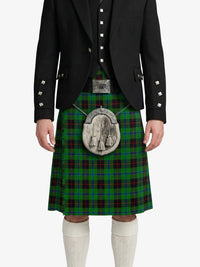 Person wearing a traditional Scottish kilt with a tartan pattern on a white background
