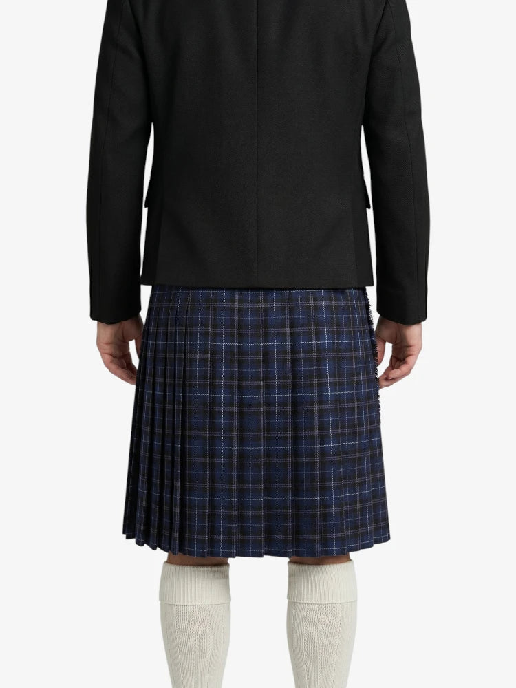 Person wearing a black jacket and plaid kilt on a white background