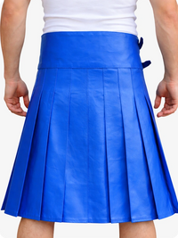 Electric Blue pleated skirt worn by a person on a white background