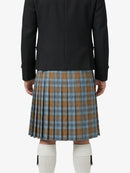 Person wearing a black jacket and plaid kilt on a white background