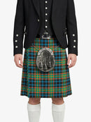 Person wearing a traditional Scottish kilt with a visible tartan pattern on a white background