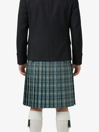 Person wearing a black jacket and green plaid kilt on a white background