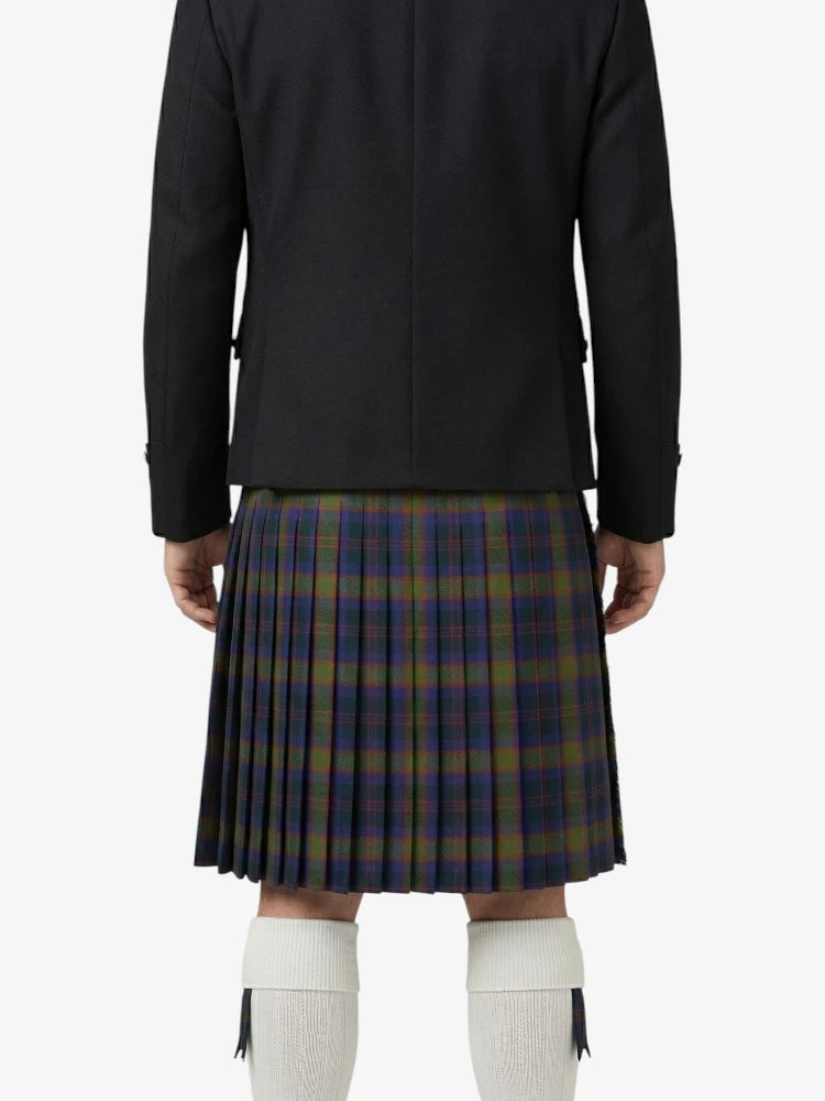 Person wearing a black jacket and plaid kilt on a white background