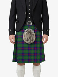 Person wearing a traditional Scottish kilt with a plaid pattern on a white background