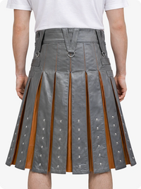 Gray pleated skirt with brown accents worn by a person on a white background