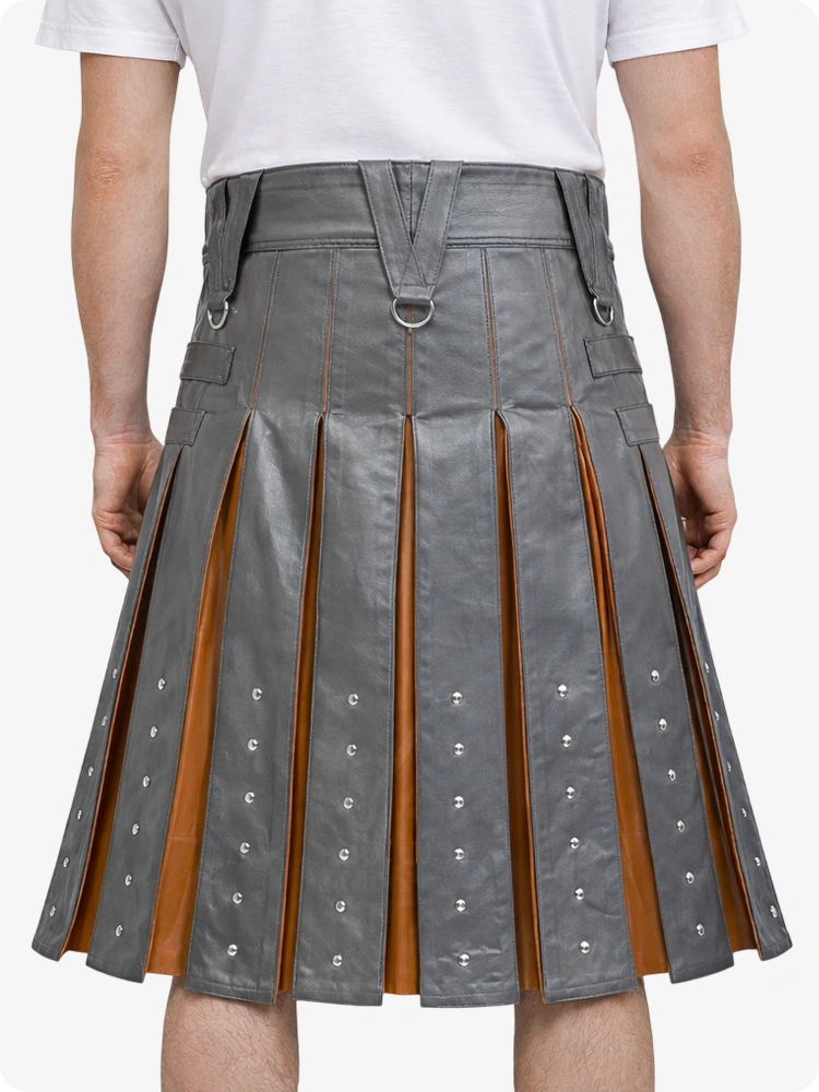 Gray pleated skirt with brown accents worn by a person on a white background