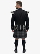 Man wearing a black doublet jacket with white accents and a grey watch plaid tartan kilt on a white background