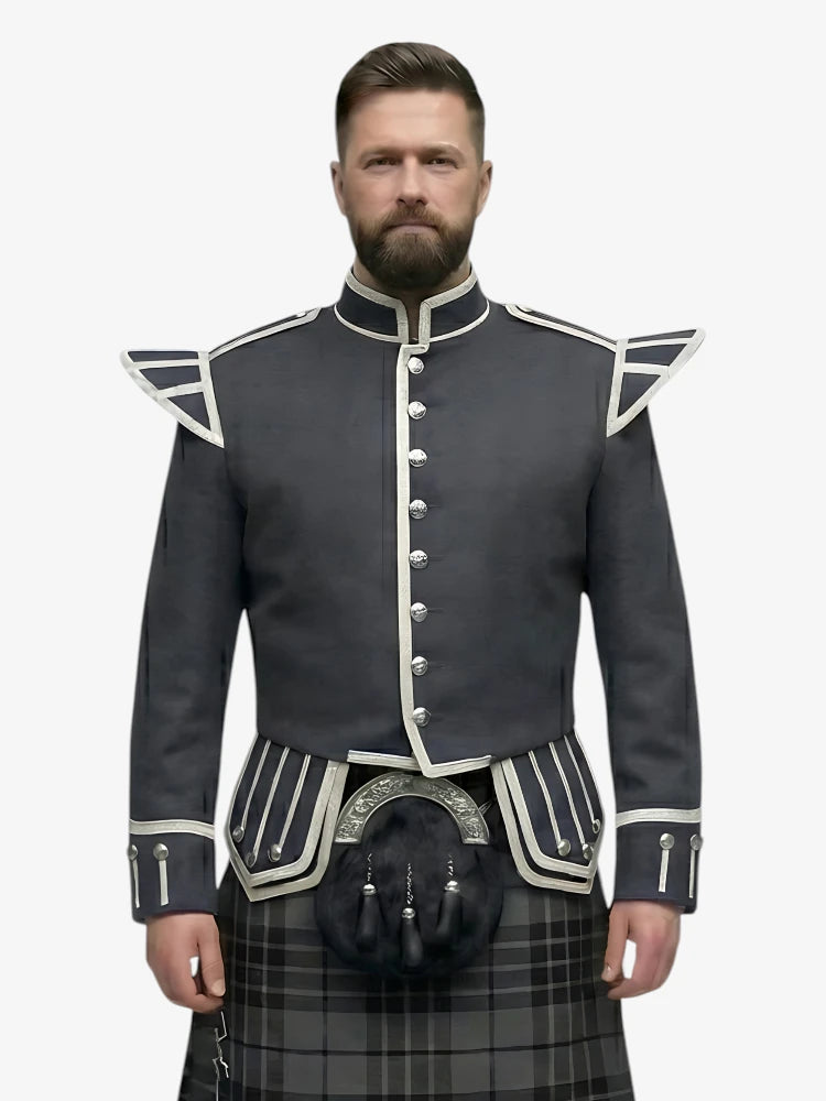 Man wearing a dark gray jacket with white trim and a grey watch tartan kilt on a white background
