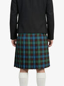 Person wearing a black jacket and plaid kilt on a white background
