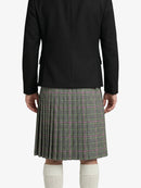 Person wearing a black jacket and plaid kilt on a white background