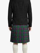 Person wearing a black jacket and green plaid kilt on a white background