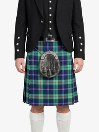 Person wearing a black jacket and green plaid kilt with a sporran on a white background