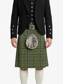 Person wearing a green plaid kilt with a black jacket on a white background
