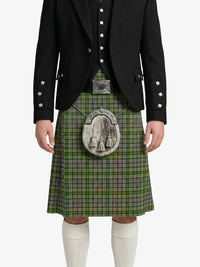 Person wearing a green plaid kilt with a black jacket on a white background