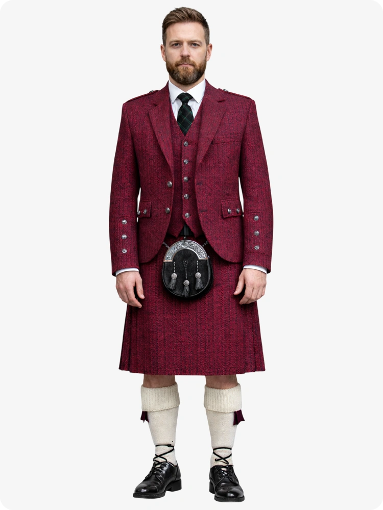 Man wearing a traditional maroon Scottish kilt outfit on a white background