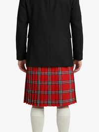 Person wearing a black coat and red plaid kilt on a white background