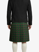 Person wearing a black jacket and green plaid kilt on a white background