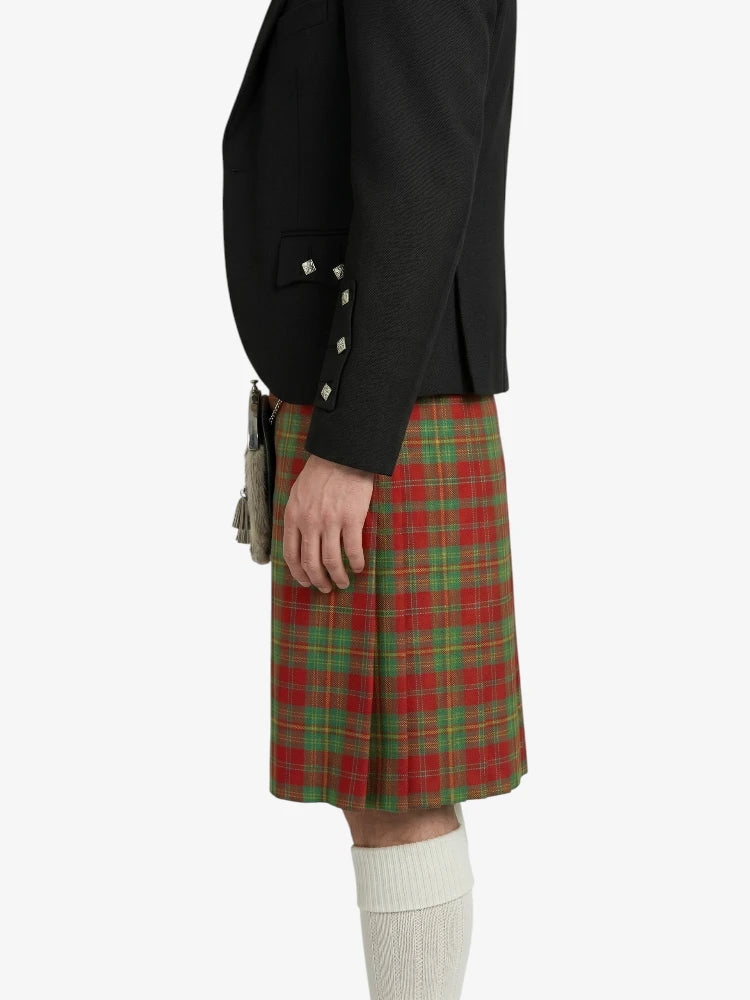 Person wearing a black jacket and red plaid kilt on a white background