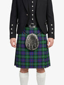 Person wearing a Scottish kilt with a tartan pattern on a white background