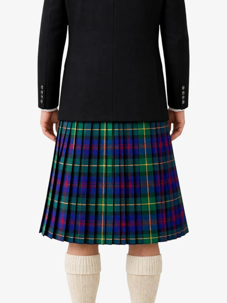 Person wearing a black jacket and plaid skirt on a white background