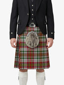 Person wearing a traditional Scottish kilt with a tartan pattern on a white background